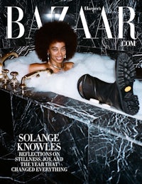 a woman in a bath tub on the cover of bazaar