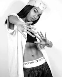 a black and white photo of a woman posing